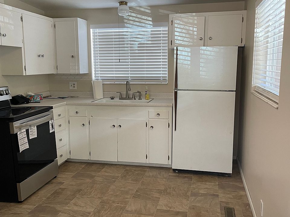 Kitchen area with New Electric Stove.