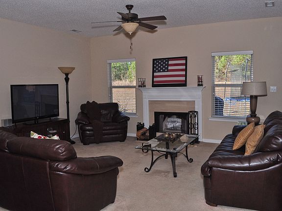 Perfect family room with wood burning fireplace!