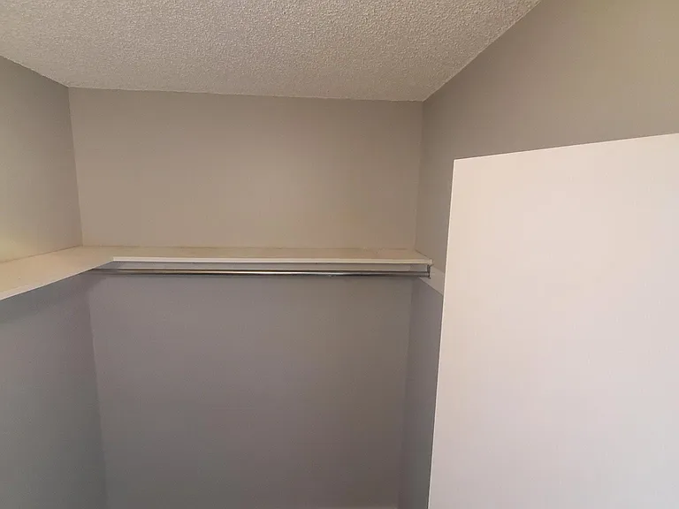 Huge walk in closet in primary room