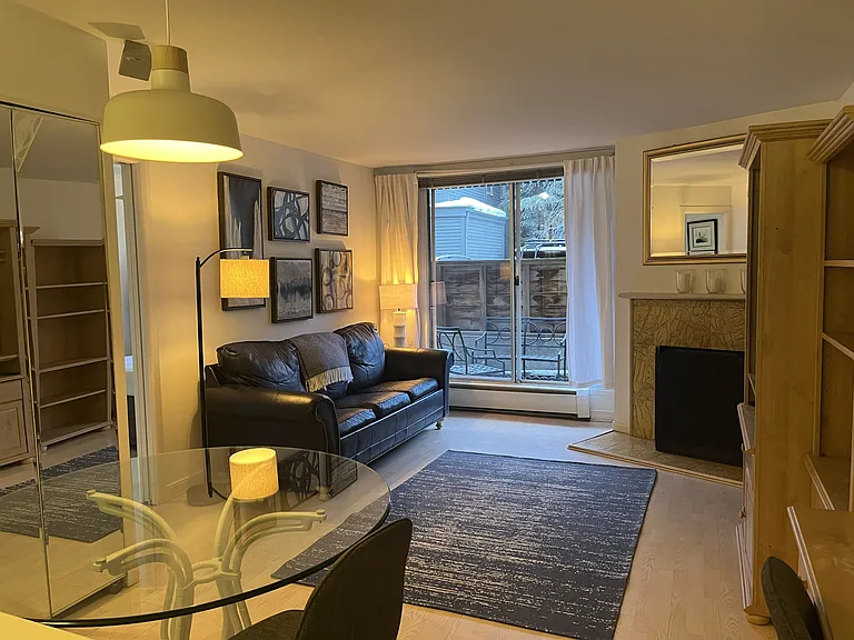 Living Room, Fireplace and Patio Access