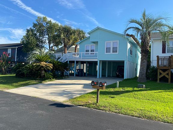 Home is a half a mile walk to the beach. Storage area downstairs can park a gold cart in it with lots of room left over.