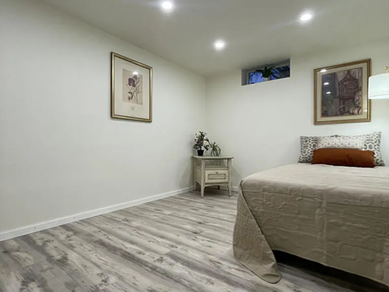 Sophisticated gray-washed flooring throughout adds a touch of contemporary elegance to your personal space.
