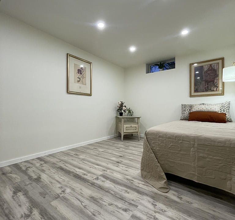 Sophisticated gray-washed flooring throughout adds a touch of contemporary elegance to your personal space.