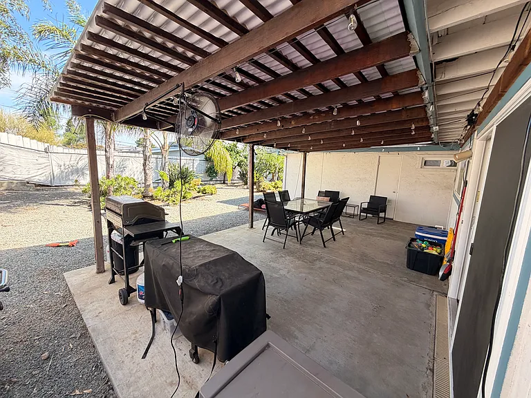Covered patio. No furniture, etc is included in the rental.