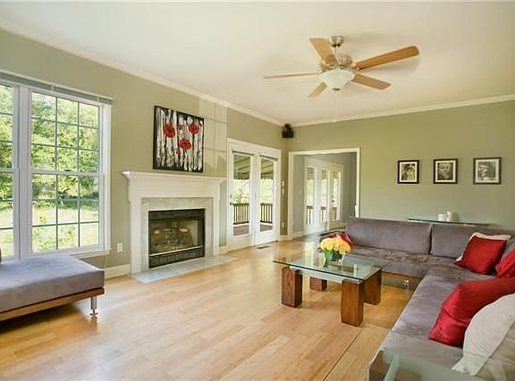 the living room is very open with bamboo hardwood