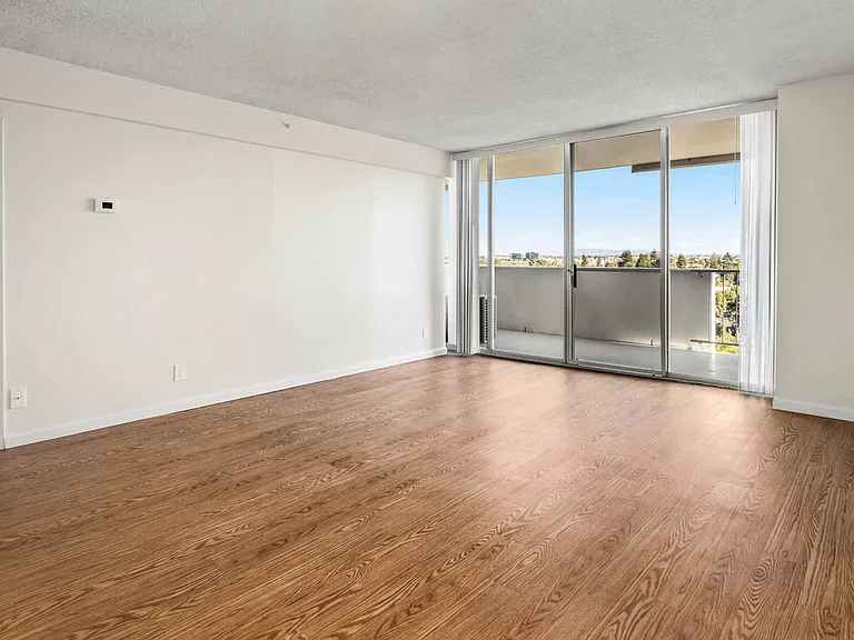 Living Room with Balcony and Hard Surface Flooring