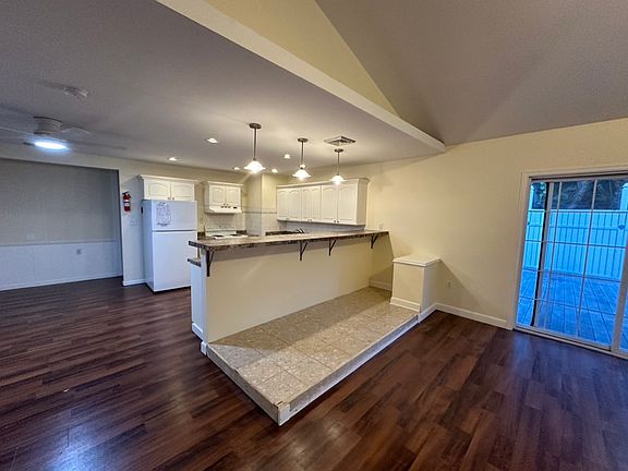 Kitchen showing area for dining table