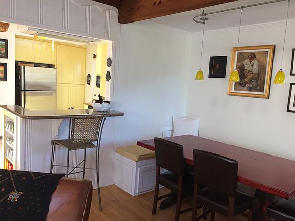 dining area & kitchen in background