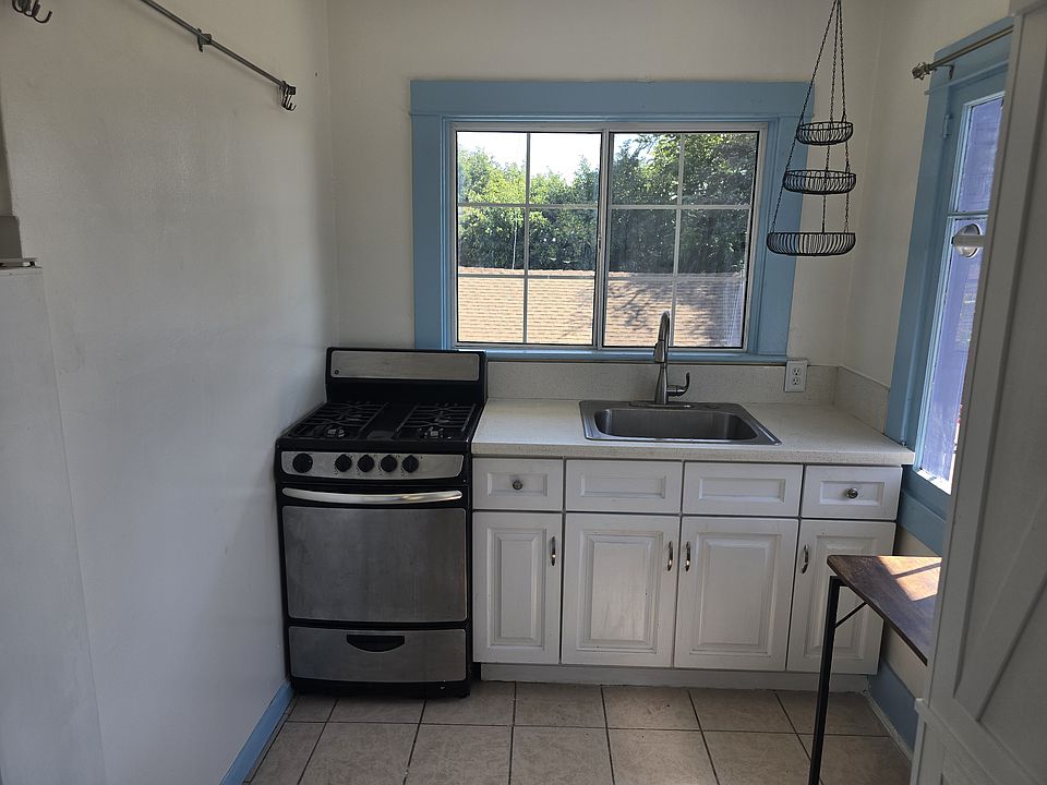 Kitchen area with oven and sink