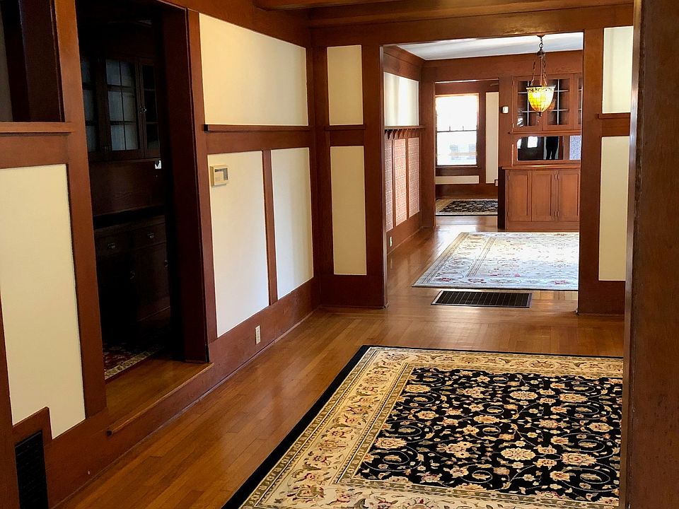View from living room to entry, dining room and family room.
