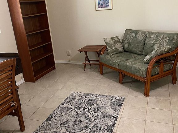 Study book shelf and settee seating