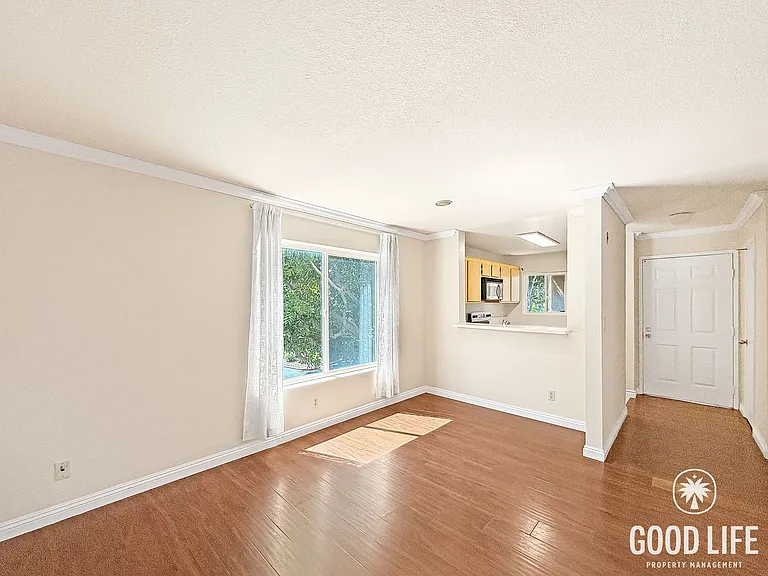 7565 Charmant Dr #302 — Photo 2