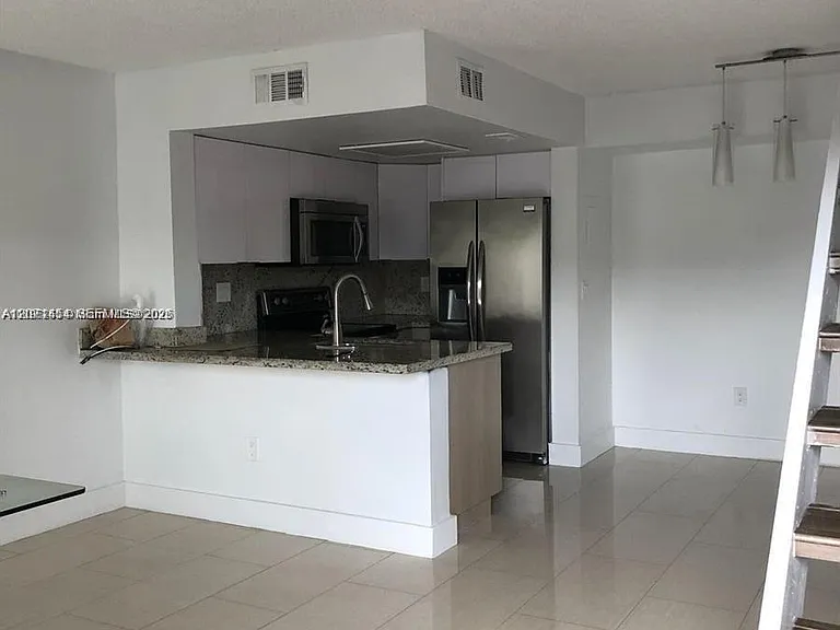 8670 NW 6th Ln #4-208 — Photo 2