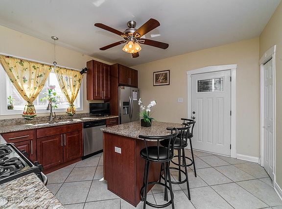 5th image of 1308 S 59th Ct