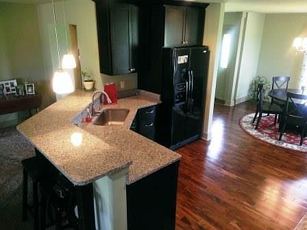 You're going to love this roomy kitchen! : Large deep sink with disposal, Granite Counters, Asian Wa