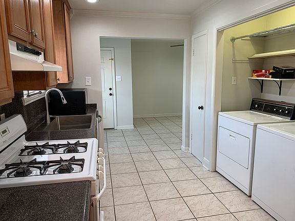 kitchen with large pantry, laundry