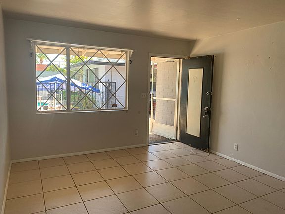 Front/Main Room looking toward front door and pool.