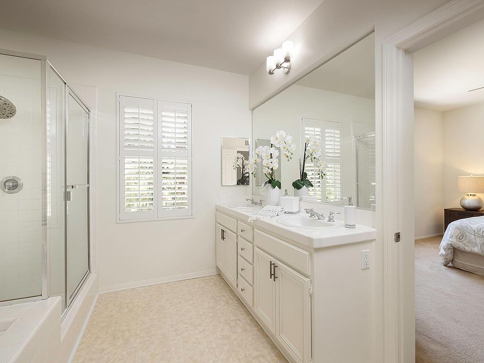 www.1StrawDone.com and you will be DUNN! Absolutely one of the best locations in the 24 hour gated community of Canyon View in Northwood pointe Irvine. Located on a quiet cul de sac with a huge lot and no neighbors behind with a view of pine trees and hil