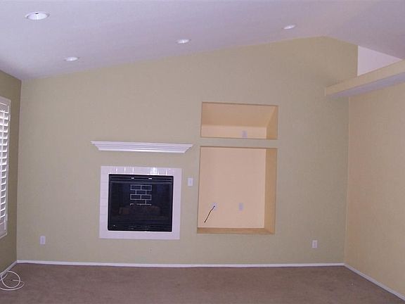 Living Rooom w/ Media Niche and Fireplace