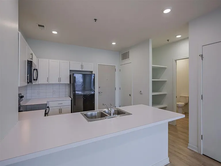 Large kitchen counter in a unit at The Rise.