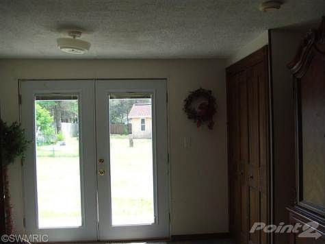 French Doors off the Dining Area to the Backyard.