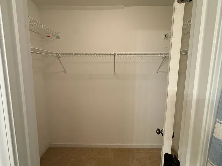 Walk in closet upstairs bathroom