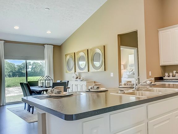 Sun-lit dining area off kitchen