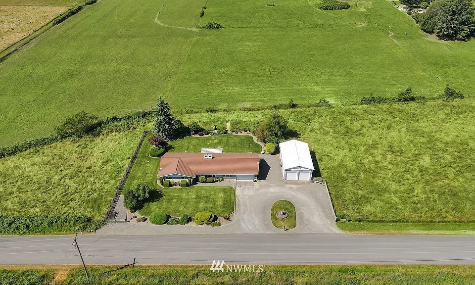 Aerial view of home & shop.>