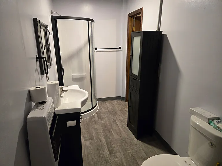 Attached bathroom off Bedroom 1.