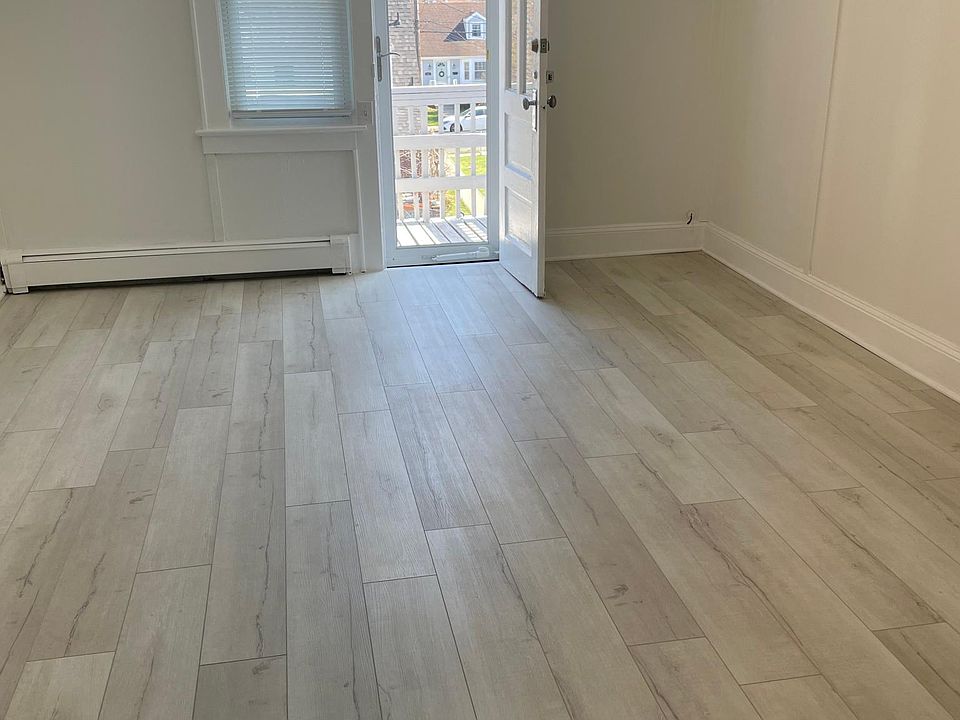 This is a picture of the bedroom with a view of the back deck.