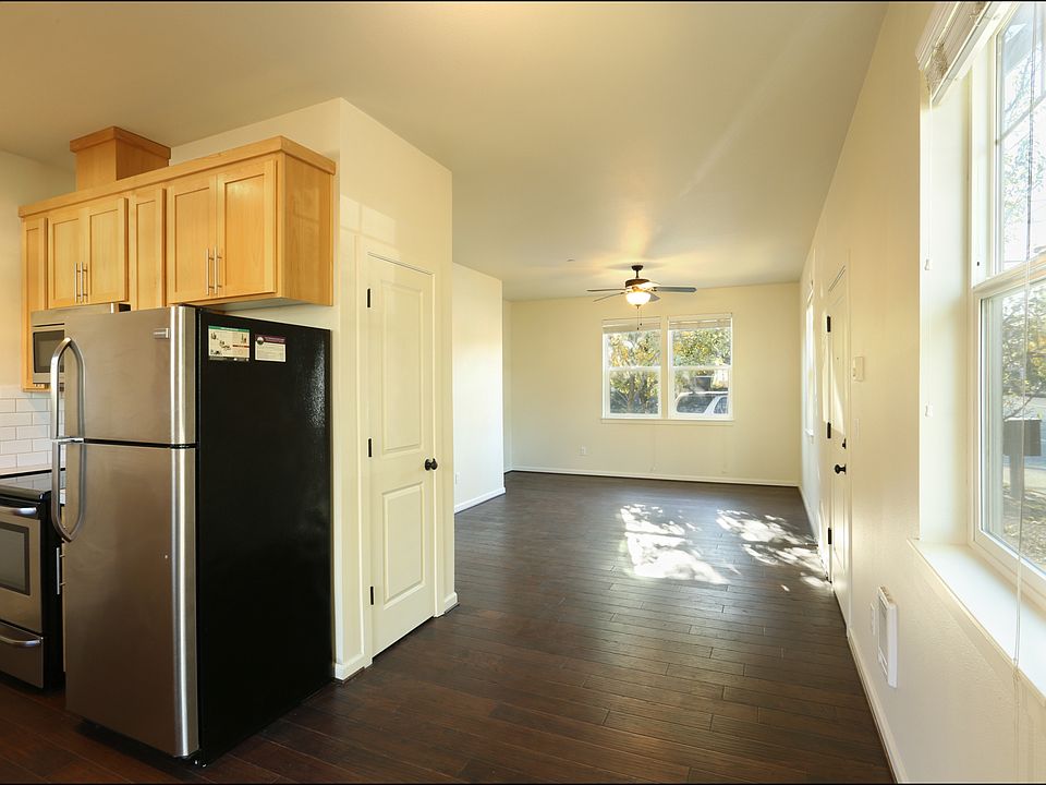looking south to living room, kitchen on left