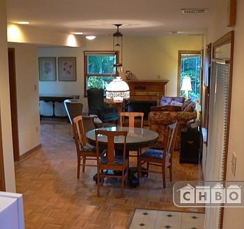 Dining Area from kitchen + doors to full Bath & large sc