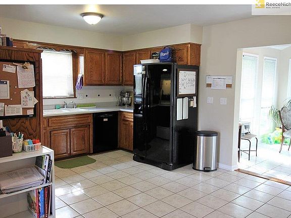 Ceramic tile runs through the large kitchen and into the sun room.  All appliances stay.