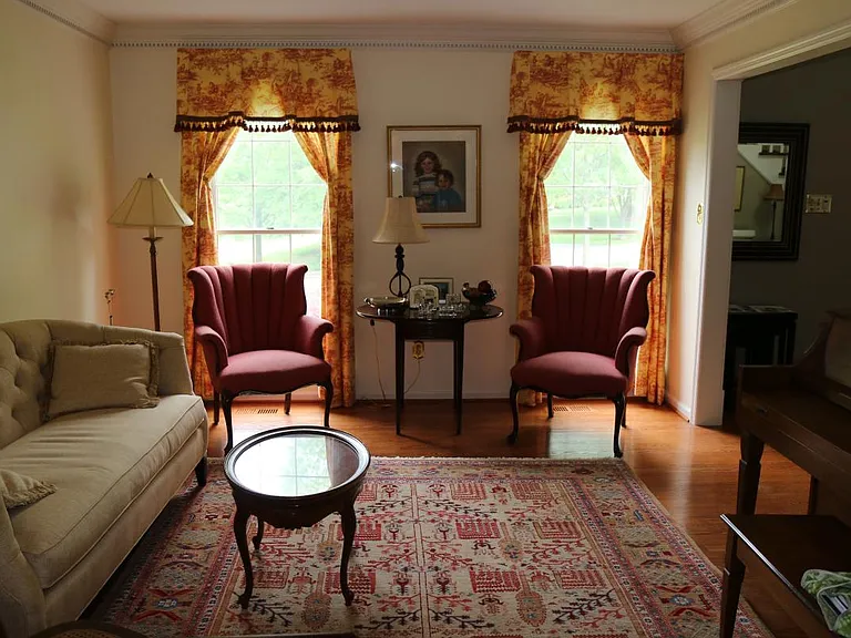 Bright living room that opens to family room