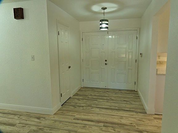 Inside foyer & coat closet