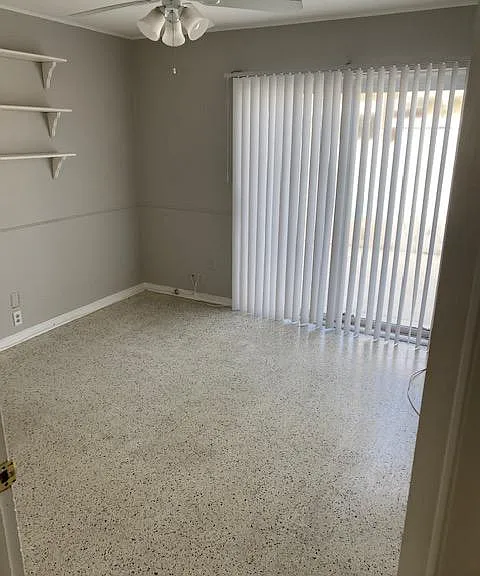 Bedroom #2 with sliding door access to outside