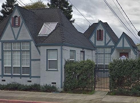 Front of house (behind gate)