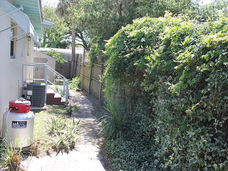 back of the house with walkway