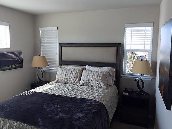 Front bedroom with queen bed and mountain views