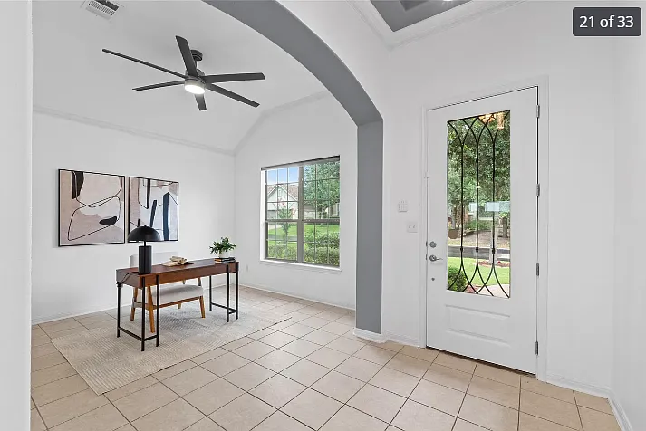 Entry way, with view of flex room (office, formal dining, formal living)