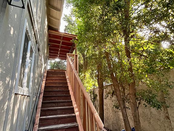 This the brand new deck that leads out into the fully-fenced side yard/patio.