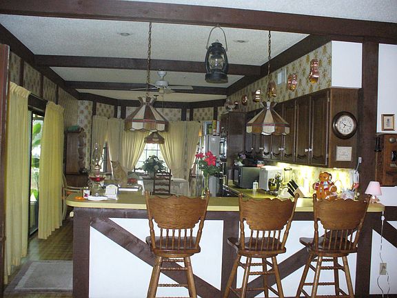 View of eat-in-kitchen w/breakfast bar!