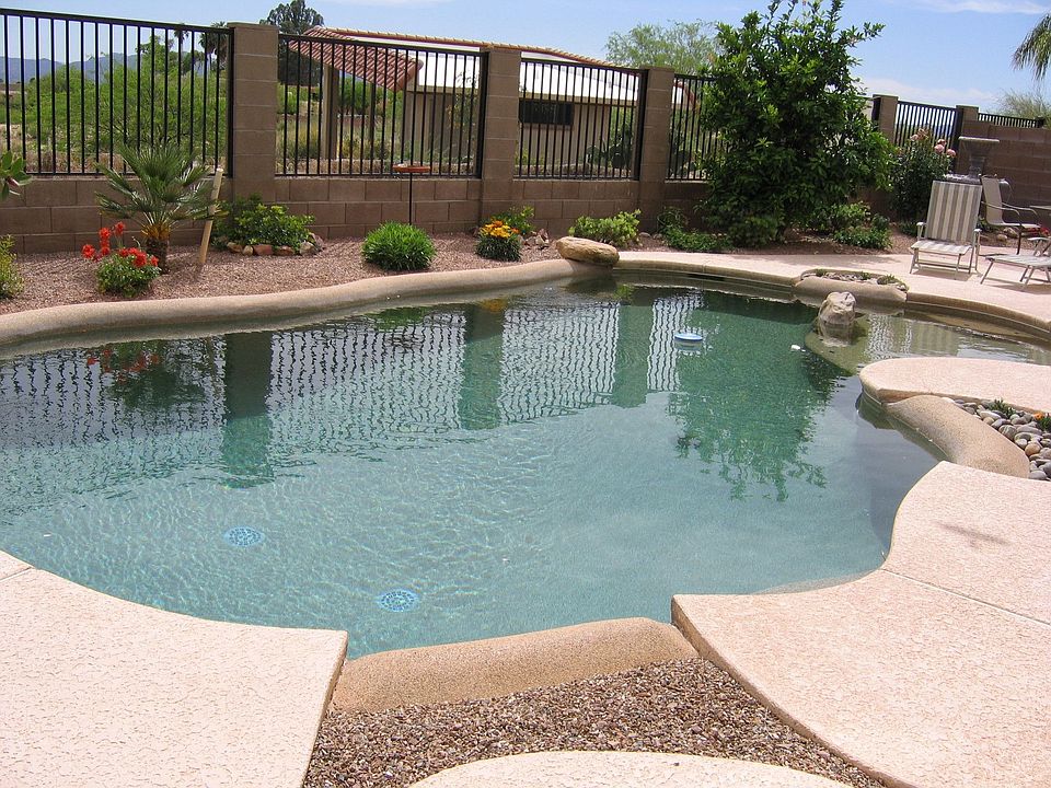 Pebble tec pool with cool decking