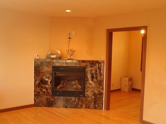 Looking at the fireplace in the Living Room