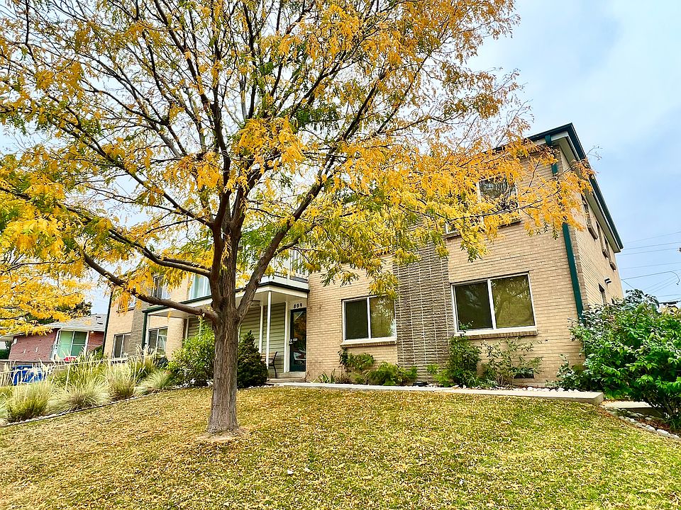 Experience the beauty and warmth of this charming home, nestled among colorful autumn trees.