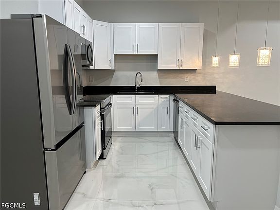 2nd image of 2641/2643 Sunniland Blvd