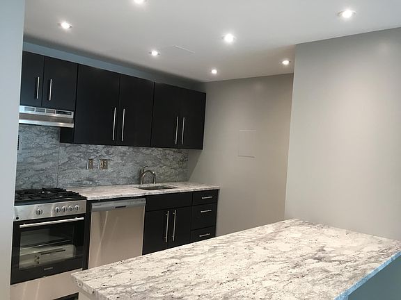 Custom designer kitchen with plenty of cabinets.