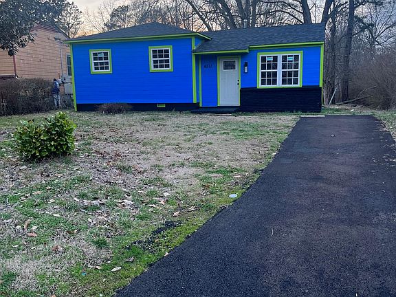 Front of property in and side included with brand new driveway
