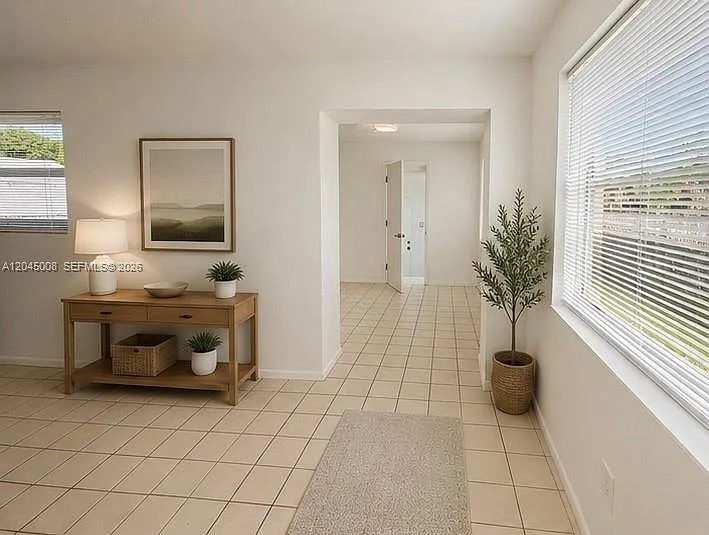 7720 Raleigh St — Photo 5