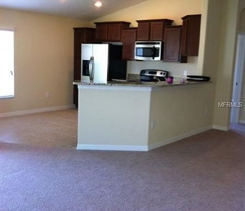 4th image of 12306 Holmwood Greens Pl
